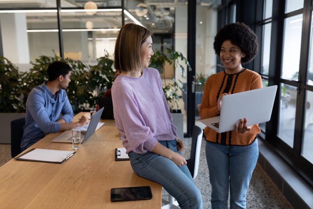 Diverse group of business people working in creative office